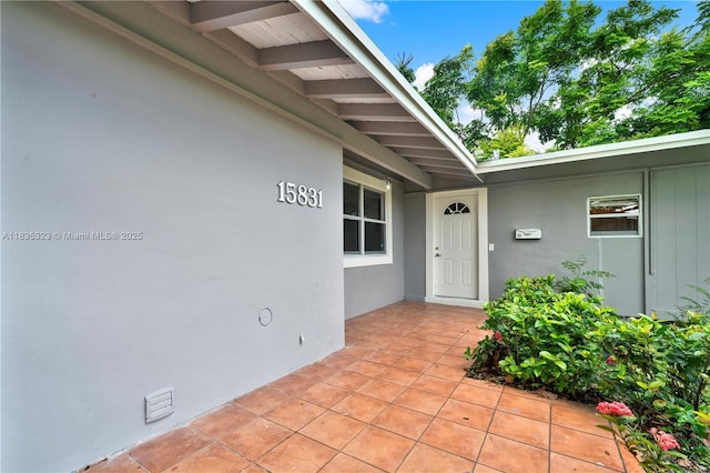 15831 Palmetto Club Dr, Miami, FL 33157 - doorway to property with stucco siding