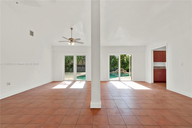 15831 Palmetto Club Dr, Miami, FL 33157 - empty room with light tile patterned floors and a ceiling fan