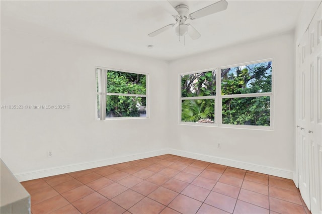 15831 Palmetto Club Dr, Miami, FL 33157 - unfurnished room featuring a ceiling fan and light tile patterned flooring