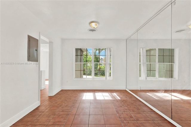 15831 Palmetto Club Dr, Miami, FL 33157 - spare room with electric panel and baseboards