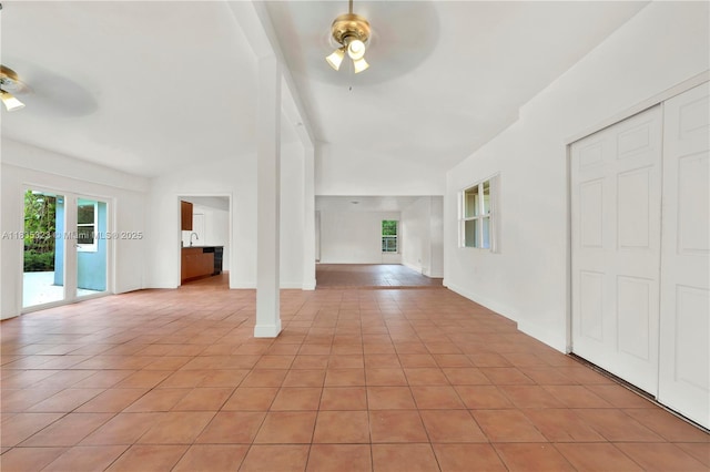 15831 Palmetto Club Dr, Miami, FL 33157 - unfurnished living room featuring ceiling fan, vaulted ceiling, and light tile patterned flooring