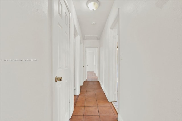 15831 Palmetto Club Dr, Miami, FL 33157 - hall with light tile patterned floors and attic access