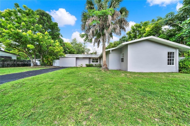 15831 Palmetto Club Dr, Miami, FL 33157 - view of front of home featuring stucco siding and asphalt driveway