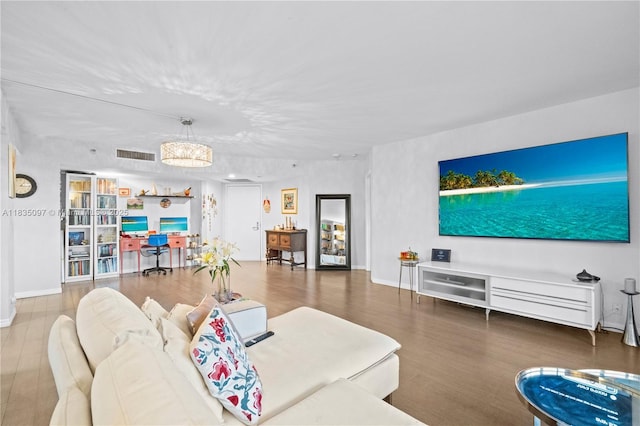 3530 Mystic Pointe Dr Unit 309, Aventura, FL 33180 - living room with wood finished floors and baseboards