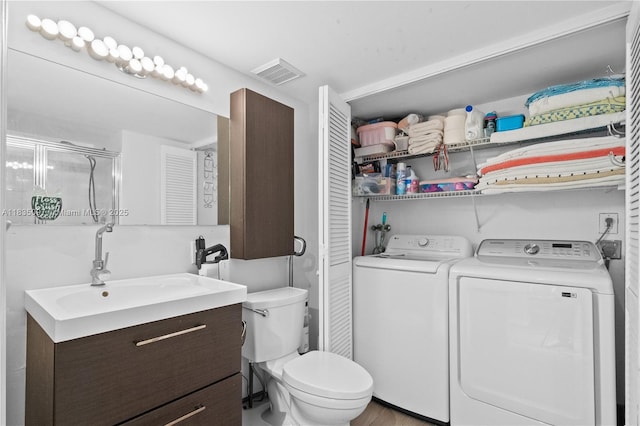 3530 Mystic Pointe Dr Unit 309, Aventura, FL 33180 - full bathroom featuring washer and dryer, vanity, a closet, and a shower with shower door