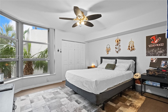 3530 Mystic Pointe Dr Unit 309, Aventura, FL 33180 - bedroom featuring a closet and a ceiling fan
