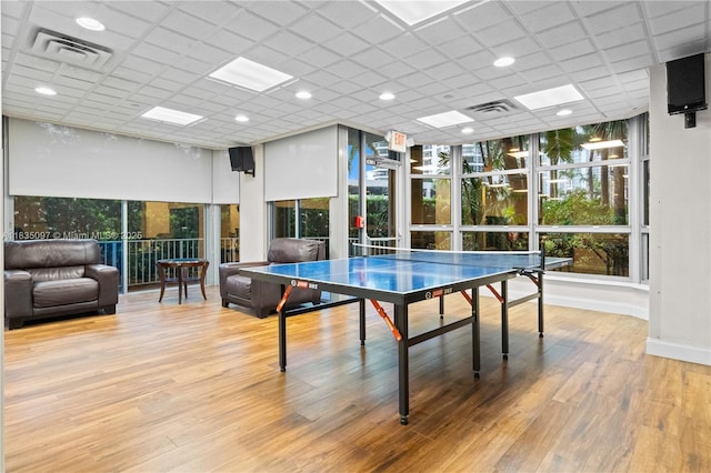 3530 Mystic Pointe Dr Unit 309, Aventura, FL 33180 - recreation room with wood finished floors and baseboards