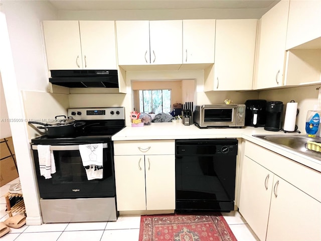 9974 SW 88th St Unit 1033, Miami, FL 33176 - kitchen featuring black dishwasher, stainless steel electric range oven, under cabinet range hood, and light countertops