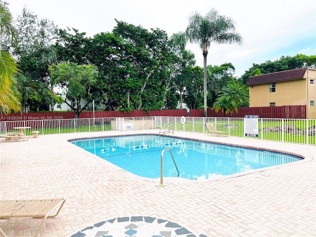 9974 SW 88th St Unit 1033, Miami, FL 33176 - community pool featuring a patio area