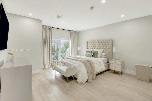 14751 SW 23rd St Unit 14751, Miami, FL 33185 - bedroom with access to outside, light wood-type flooring, and recessed lighting