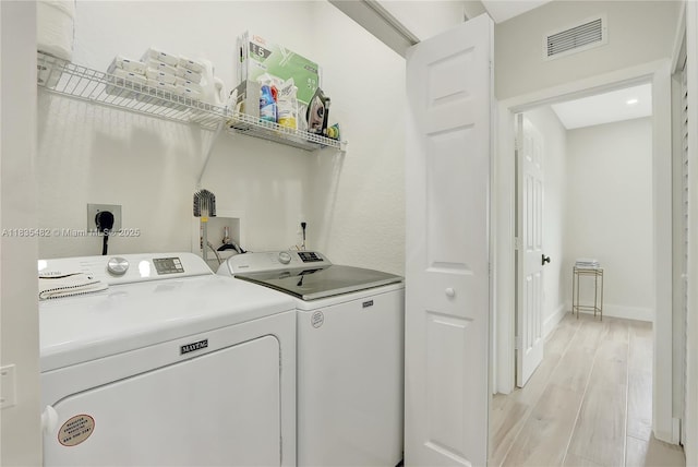 14751 SW 23rd St Unit 14751, Miami, FL 33185 - washroom featuring independent washer and dryer and light wood-style floors