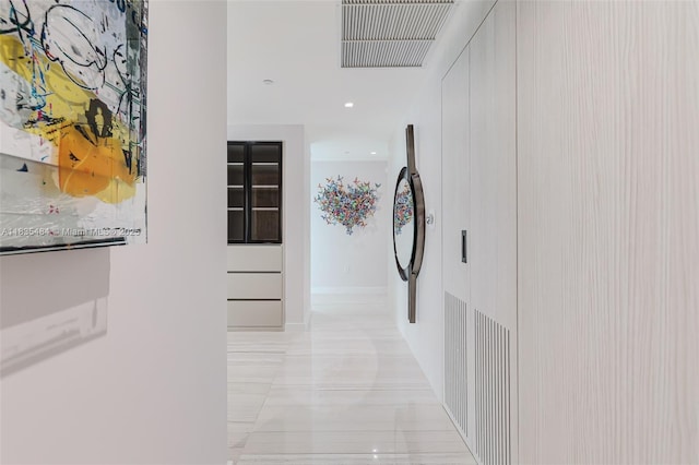 3131 NE 7th Ave Unit 4001, Miami, FL 33137 - hallway with light marble finish floors and recessed lighting