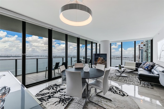 3131 NE 7th Ave Unit 4001, Miami, FL 33137 - dining room with expansive windows, a water view, and marble finish flooring