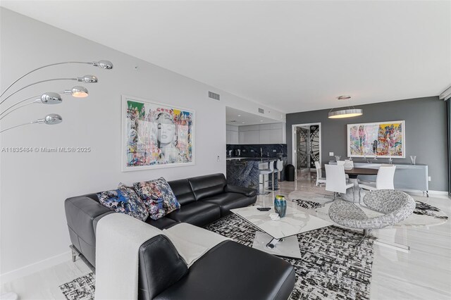 3131 NE 7th Ave Unit 4001, Miami, FL 33137 - living room featuring baseboards