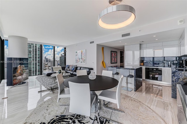 3131 NE 7th Ave Unit 4001, Miami, FL 33137 - dining space featuring floor to ceiling windows