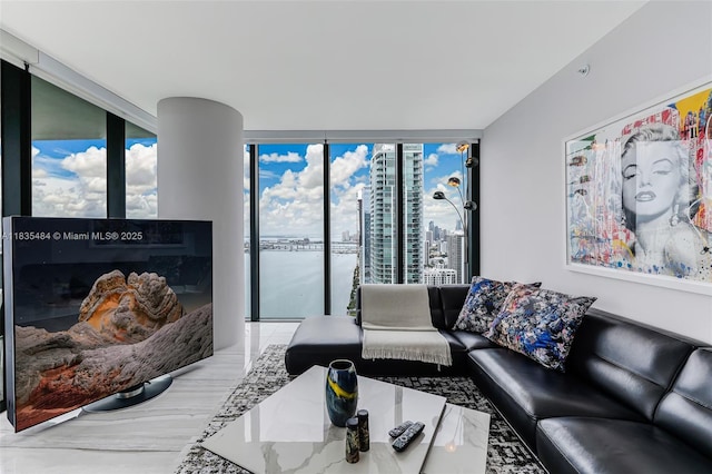 3131 NE 7th Ave Unit 4001, Miami, FL 33137 - living area featuring floor to ceiling windows, a city view, and healthy amount of natural light