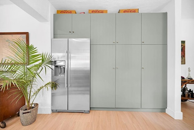135 NE 87th St, El Portal, FL 33138 - kitchen featuring high quality fridge, light wood-style floors, and gray cabinets