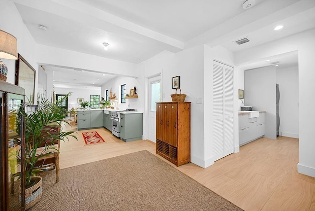 135 NE 87th St, El Portal, FL 33138 - hall with light wood-style floors and recessed lighting