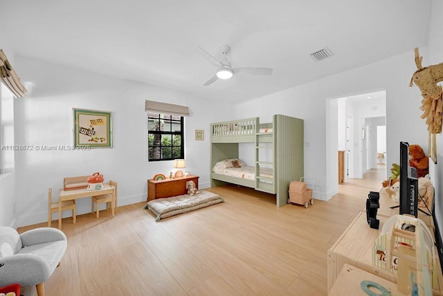 135 NE 87th St, El Portal, FL 33138 - bedroom featuring light wood-type flooring and a ceiling fan