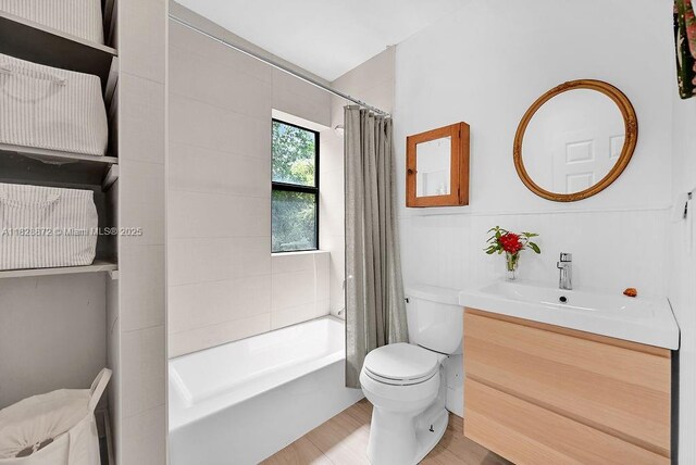 135 NE 87th St, El Portal, FL 33138 - full bath with vanity, shower / bath combo, and wood finished floors