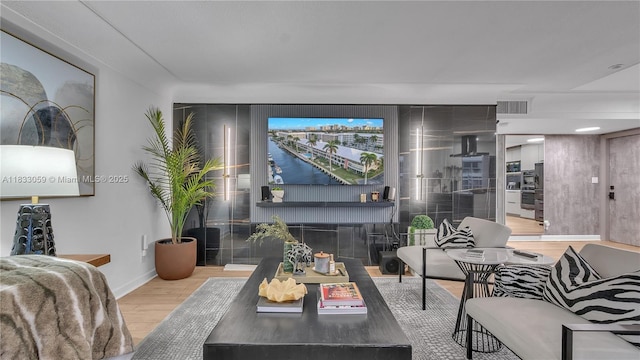 3051 NE 47th Ct Unit 207, Fort Lauderdale, FL 33308 - living area with wood finished floors and baseboards