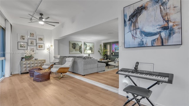 3051 NE 47th Ct Unit 207, Fort Lauderdale, FL 33308 - living room featuring wood finished floors and ceiling fan