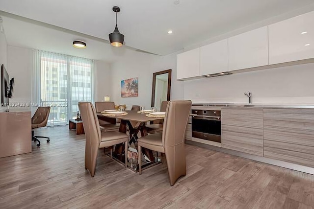 777 N Ocean Dr Unit N401, Hollywood, FL 33019 - dining space featuring light wood-style flooring