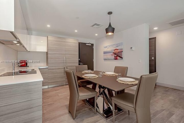 777 N Ocean Dr Unit N401, Hollywood, FL 33019 - dining room with light wood-type flooring and recessed lighting