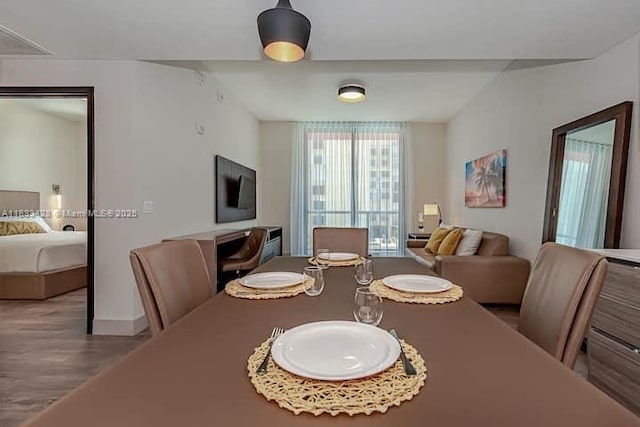 777 N Ocean Dr Unit N401, Hollywood, FL 33019 - dining room with wood finished floors and expansive windows