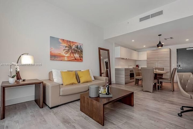 777 N Ocean Dr Unit N401, Hollywood, FL 33019 - living area featuring light wood-style floors and recessed lighting