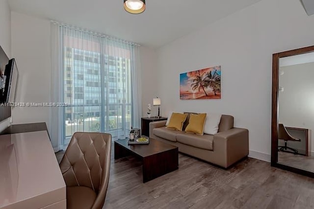 777 N Ocean Dr Unit N401, Hollywood, FL 33019 - living area with wood finished floors and baseboards