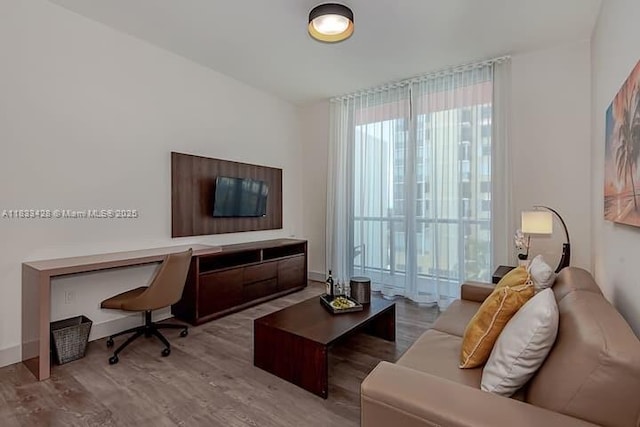 777 N Ocean Dr Unit N401, Hollywood, FL 33019 - living room with a desk and wood finished floors