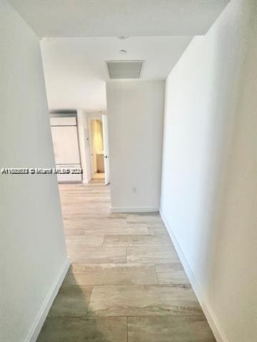 45 SW 9th St Unit 3009, Miami, FL 33130 - hall featuring attic access and baseboards