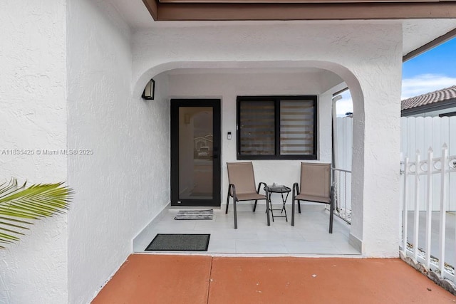 7029 W 29th Way, Hialeah, FL 33018 - doorway to property with stucco siding