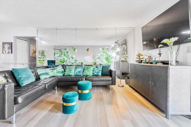 1890 W 56th St Unit 1411, Hialeah, FL 33012 - living area featuring wood finished floors and a textured ceiling