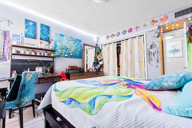 1890 W 56th St Unit 1411, Hialeah, FL 33012 - bedroom with a textured ceiling