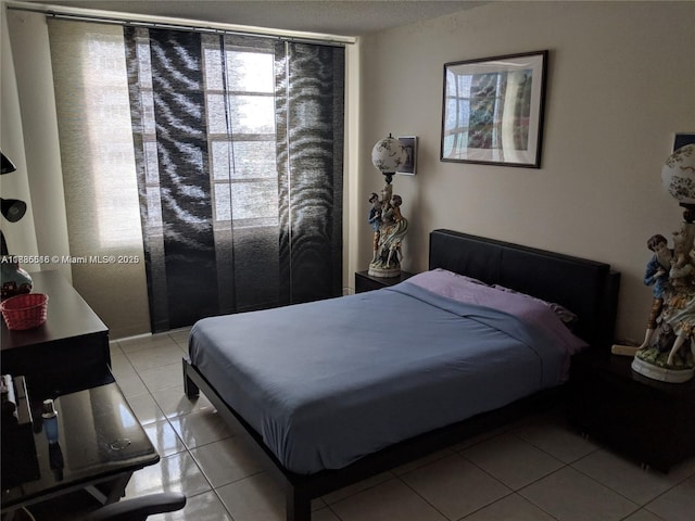1980 S Ocean Dr Unit 15C, Hallandale Beach, FL 33009 - bedroom featuring light tile patterned flooring