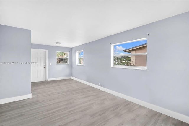 1408 9th St, West Palm Beach, FL 33401 - empty room featuring wood finished floors