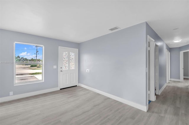 1408 9th St, West Palm Beach, FL 33401 - foyer with wood finished floors and baseboards
