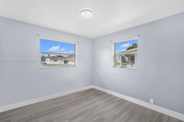 1408 9th St, West Palm Beach, FL 33401 - unfurnished room with plenty of natural light and wood finished floors