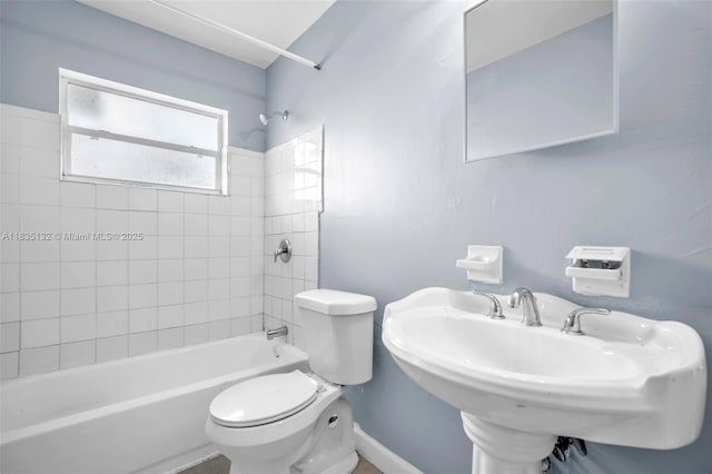 1408 9th St, West Palm Beach, FL 33401 - bathroom with washtub / shower combination and toilet