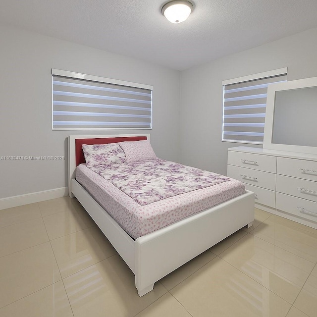 1320 NW 179th Ter, Miami Gardens, FL 33169 - bedroom featuring light tile patterned floors and a textured ceiling