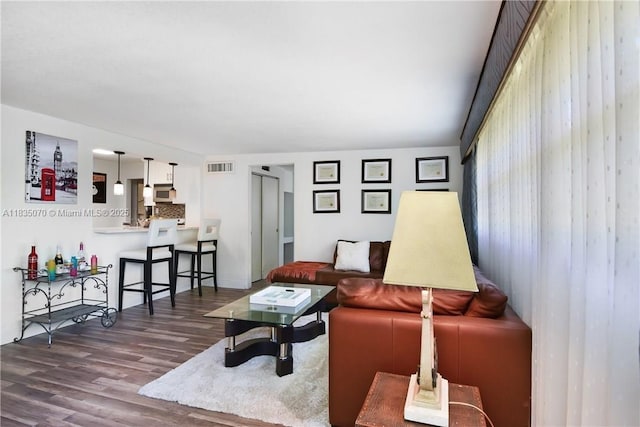 7051 SW 29th St, Miramar, FL 33023 - living area featuring wood finished floors