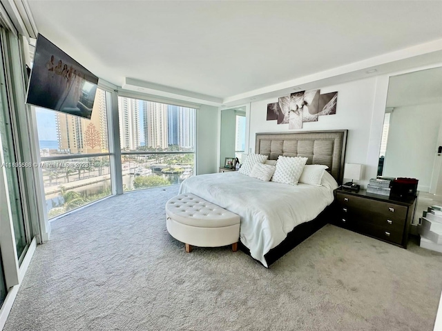 16400 Collins Ave Unit 841, Sunny Isles Beach, FL 33160 - carpeted bedroom featuring multiple windows