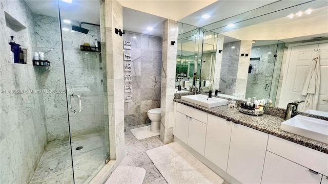 16400 Collins Ave Unit 841, Sunny Isles Beach, FL 33160 - bathroom with double vanity, a marble finish shower, marble finish floors, tile walls, and recessed lighting