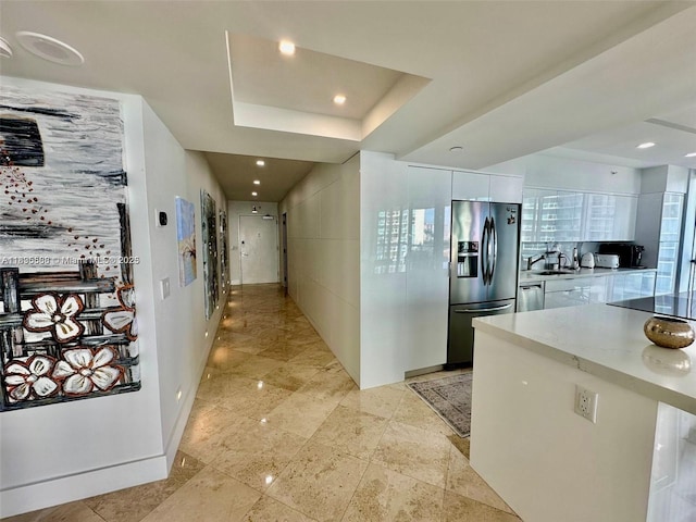 16400 Collins Ave Unit 841, Sunny Isles Beach, FL 33160 - hall featuring recessed lighting and a tray ceiling