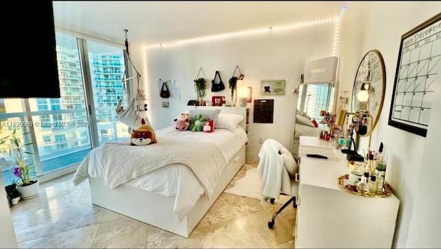 16400 Collins Ave Unit 841, Sunny Isles Beach, FL 33160 - bedroom featuring a wall of windows