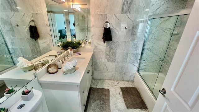 16400 Collins Ave Unit 841, Sunny Isles Beach, FL 33160 - bathroom featuring vanity, combined bath / shower with glass door, and marble look tile flooring