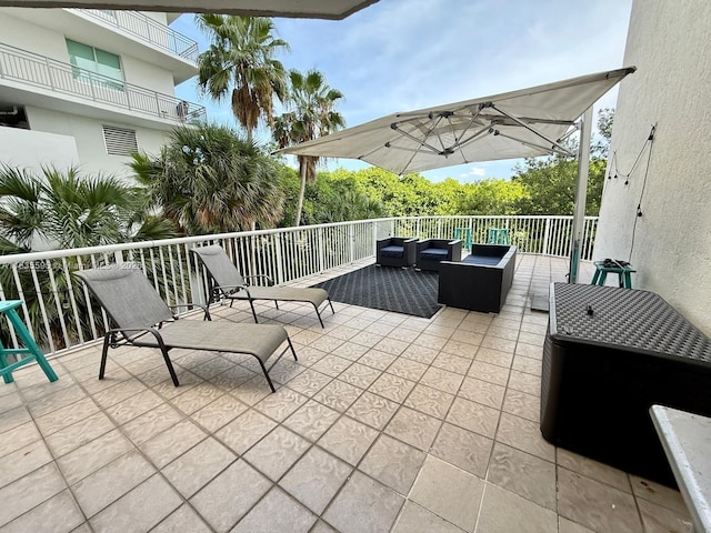280 SW 20th Rd Unit 404, Miami, FL 33129 - view of patio featuring an outdoor living space