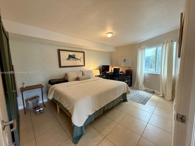 280 SW 20th Rd Unit 404, Miami, FL 33129 - bedroom with a textured ceiling, light tile patterned floors, and an office area